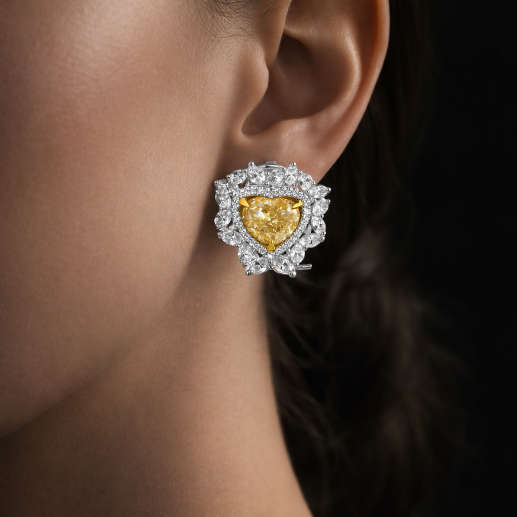 Marigold 5 Carats Heart Cut Fancy Yellow Diamond Stud Earrings in 14K White Gold On Ear