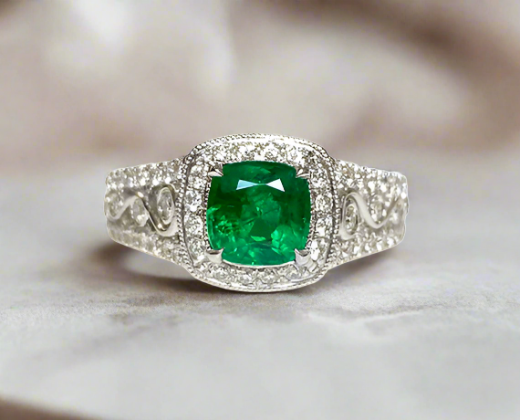 Aspen Emerald Cushion Cut Gemstone Ring in 18K White Gold table top