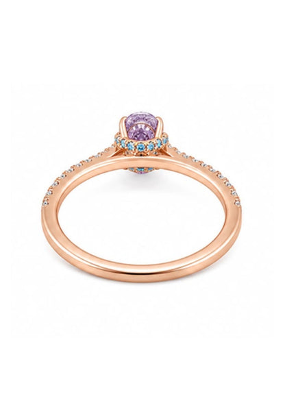 Rear view of a custom rose gold engagement ring featuring a Fancy Intense Pink Purple oval diamond with an aqua blue hidden halo.