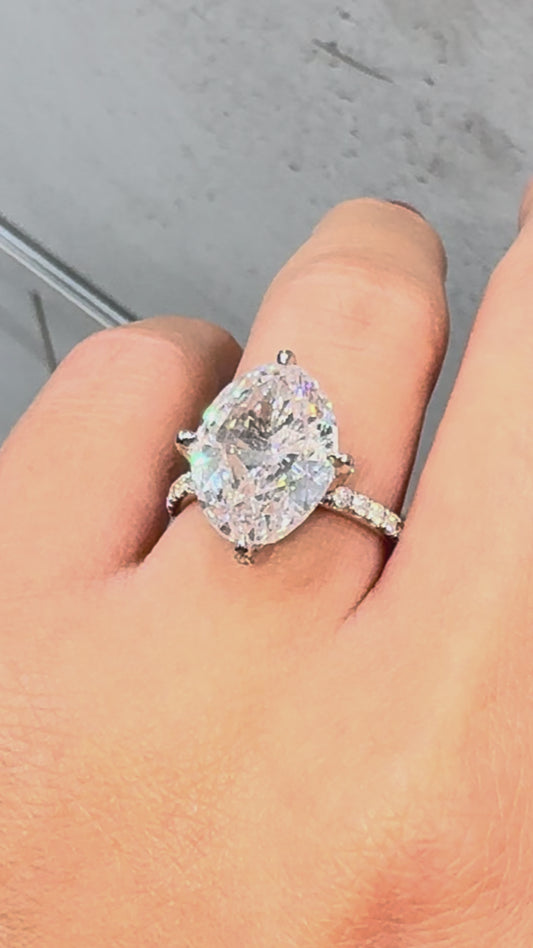 Compass prong 7 carat oval diamond engagement ring