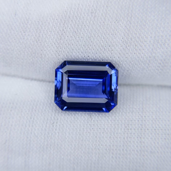 5.06 Carat Emerald Cut Heat Medium Blue Sapphire Loose Gemstone Video 1