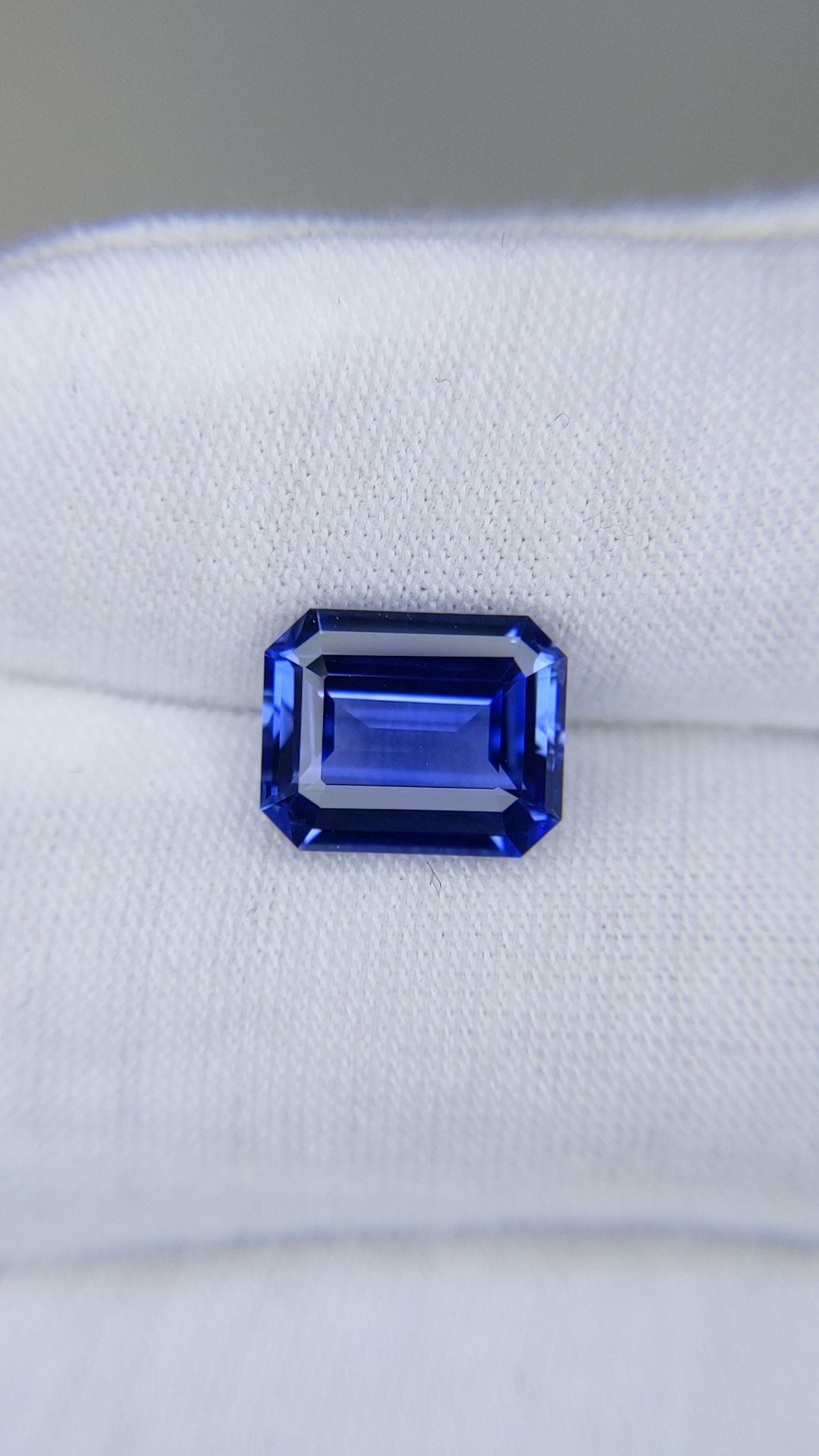 5.06 Carat Emerald Cut Heat Medium Blue Sapphire Loose Gemstone Video 1