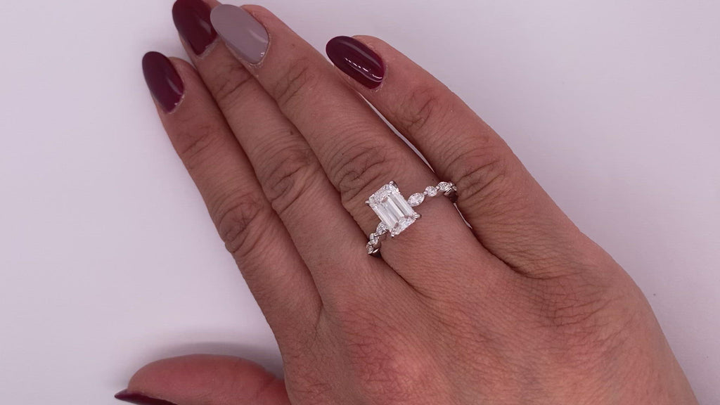 Diamond Ring Emerald Cut 2 Carat Sidestone Ring in 18K  White Gold Video on Hand