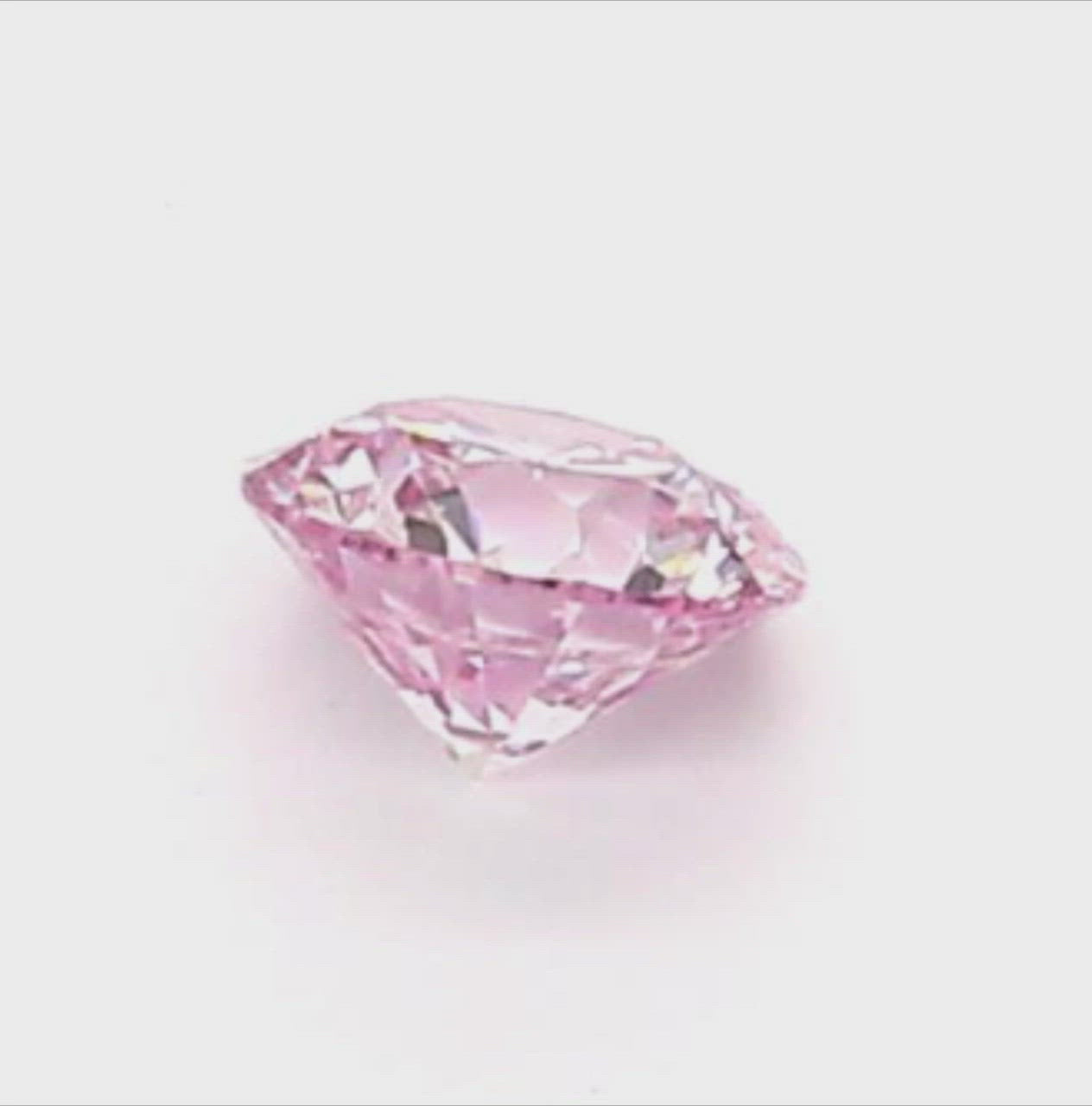 Fancy Light Pink Argyle Diamond Round Shape .12 Carat Full Video View