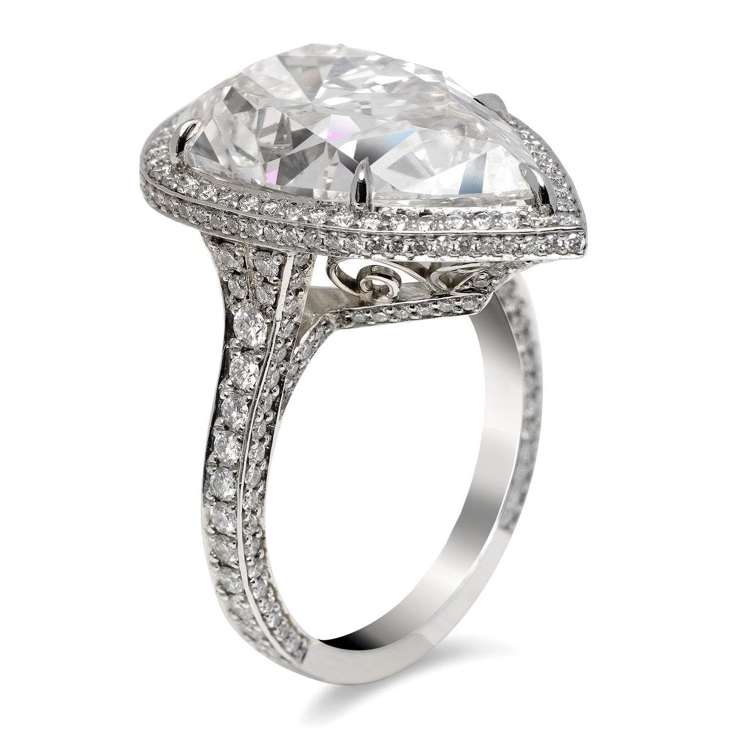 Diamond Ring Pear Shape Cut 12 Carat Halo Ring in Platinum Side View