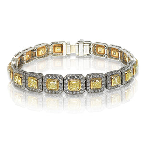 Yellow Diamond Bracelet Cushion Cut 23 Carat Inline Halo Tennis Bracelet in 18K White Gold Front View