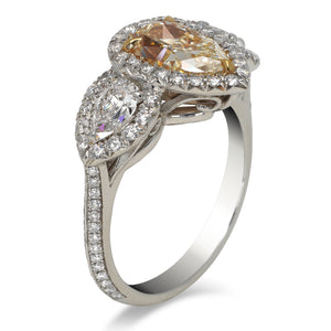 Yellow Diamond Ring Pear Shape Cut 3 Carat Halo Ring in Platinum Side View