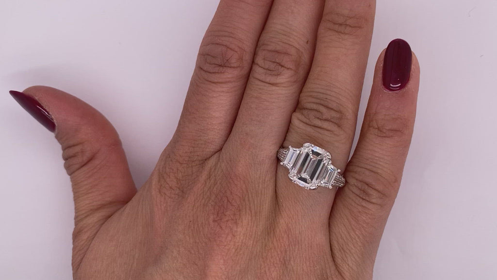 Diamond Ring Emerald Cut 4 Carat Three Stone in Platinum Video on Hand