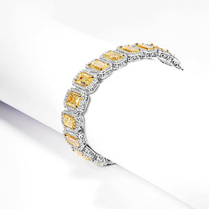 Priscilla 36 Carats Yellow Emerald Cut Halo Diamond Tennis Bracelet in 18k White Gold