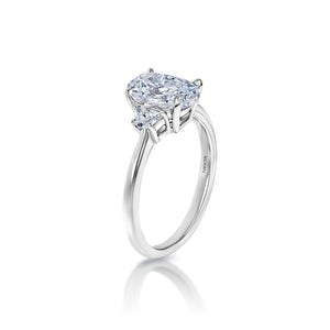 Mckenna 2 Carat G VVS1 Oval Cut Diamond Half Moon Three Stone Engagement Ring in Platinum Side View