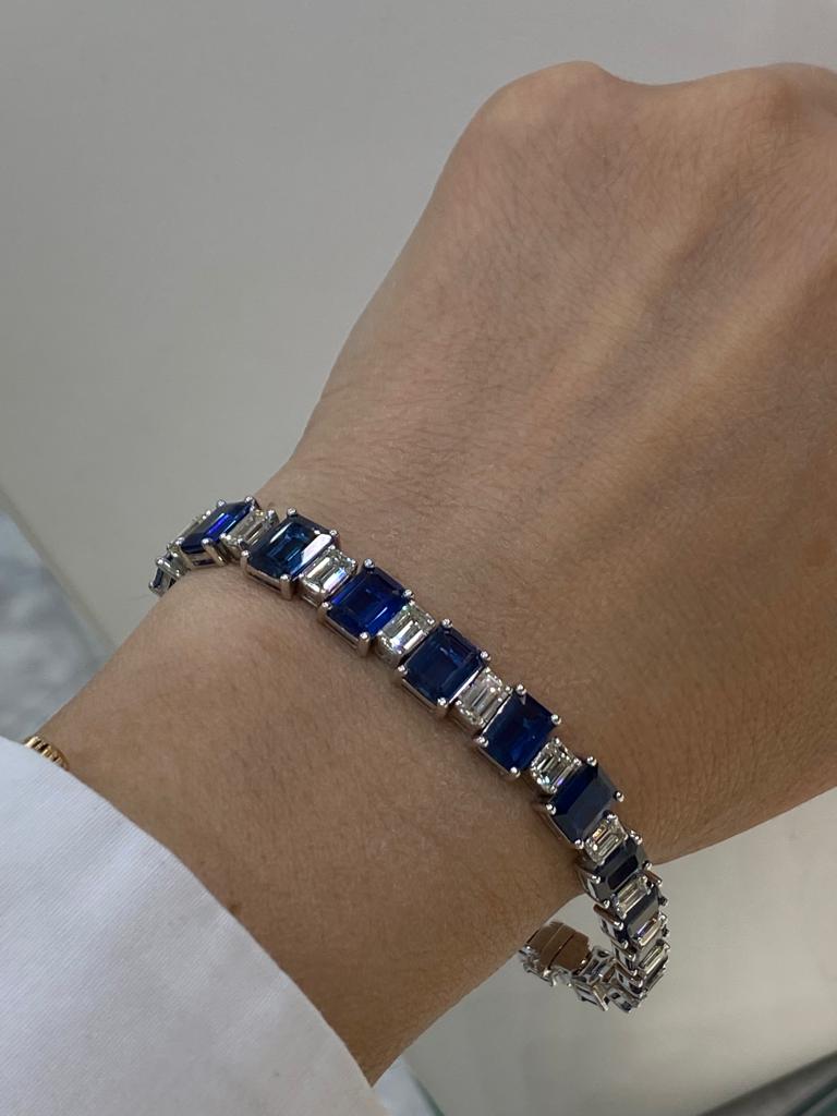 Dallas 28 Carat Blue Emerald Cut Sapphire and Diamond Single Row Bracelet on wrist 1
