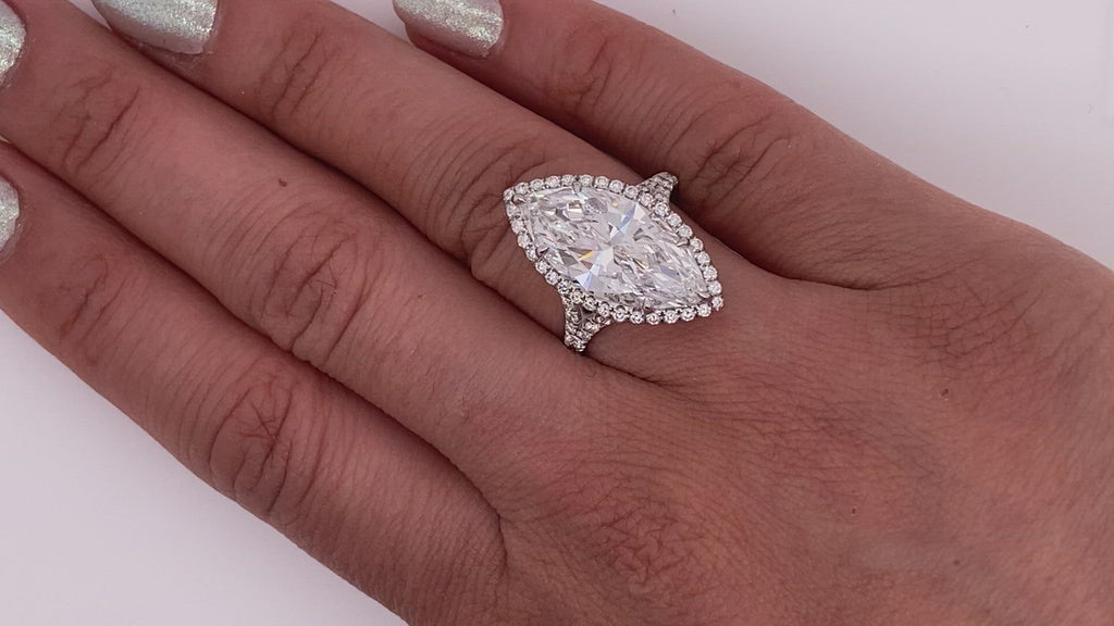 Diamond Ring Marquise Cut 6 Carat Sidestone Ring in Platinum Video on Hand