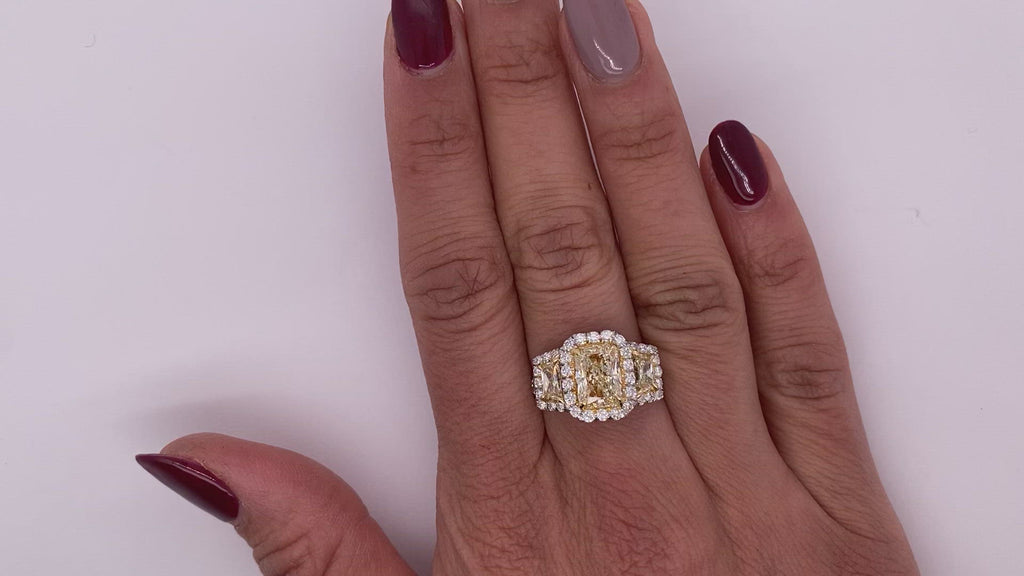 Yellow Diamond Ring Radiant Cut 5 Carat Three Stone Ring in Platinum & 18K Gold Video on Hand
