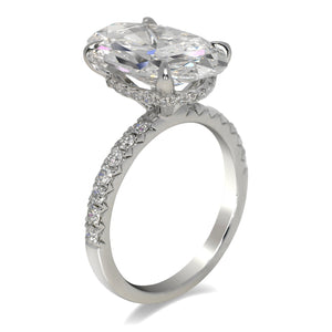 Diamond Ring Oval Cut 6 Carat Sidestone Ring in Platinum Side View