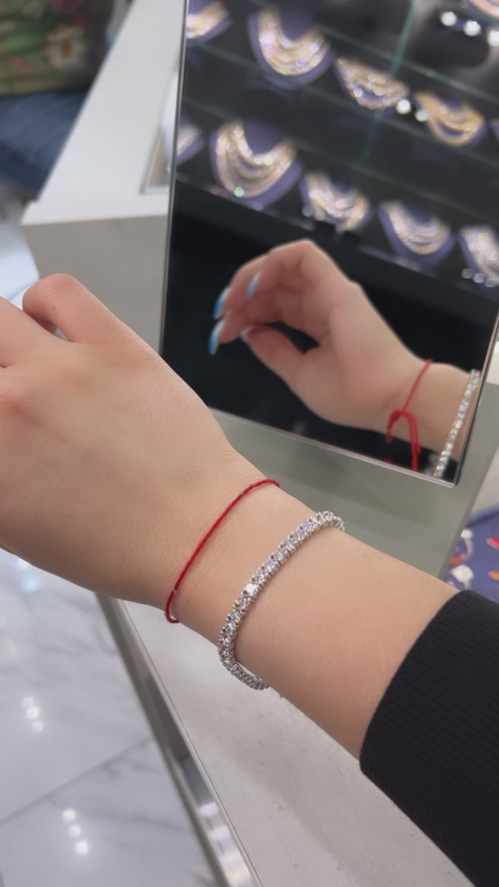 Video of tennis bracelet containing Lab Grown Diamond's 14 karat white gold 8.6 carats