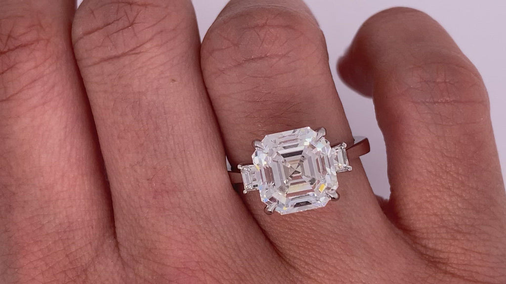 Diamond Ring Asscher Cut 5 Carat three stone ring in 18k White Gold Video on Hand