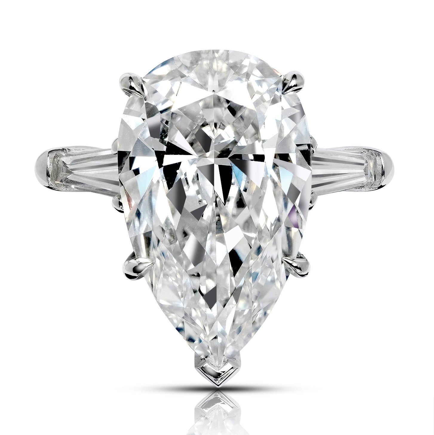 Majestic Pear cut Diamond Essence ring. 3 carat Pear center encircled by  baguettes accents on either side. 5.0 cts.t.w. in 14K Solid White Gold.