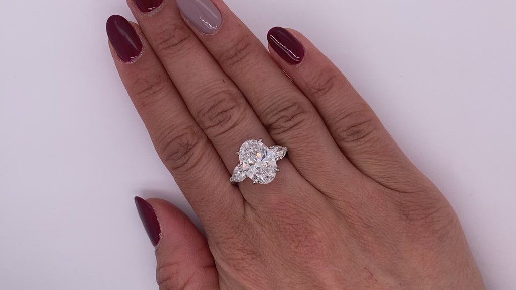 Diamond Ring Oval Cut 6 Carat Three Stone Ring in Platinum Video on Hand