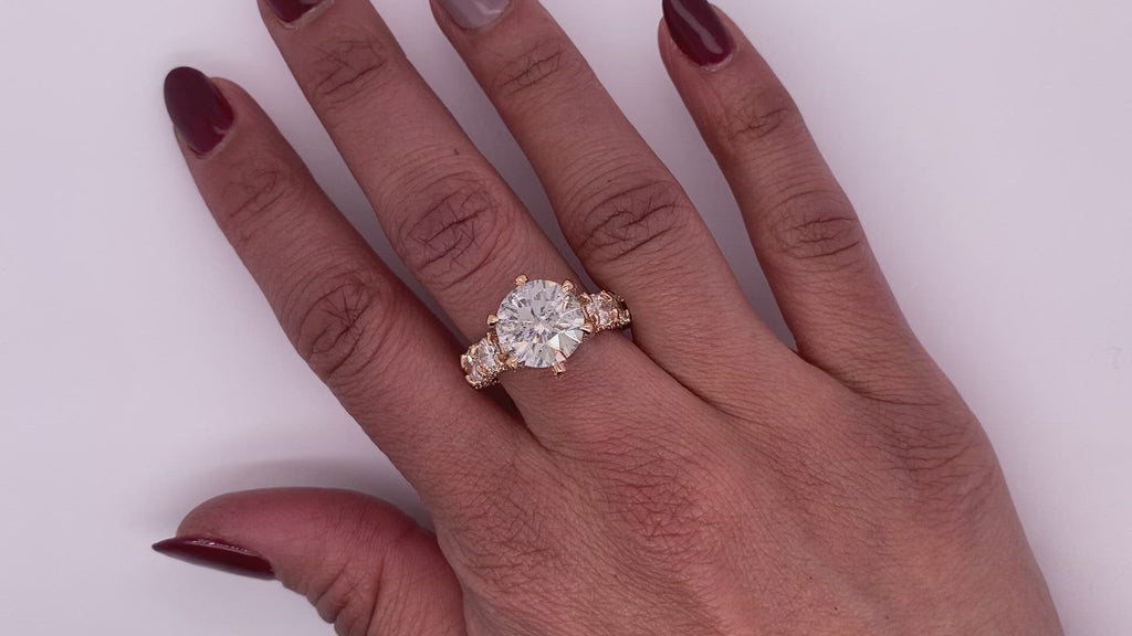 Diamond Ring Round Cut 10 Carat Sidestone Ring in 18K Rose Gold Video on Hand