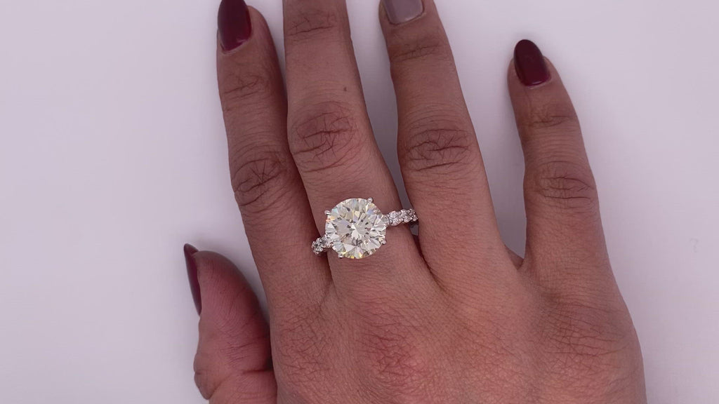 Diamond Ring Round Cut 8 Carat Sidestone Ring in 18K White Gold Video on Hand