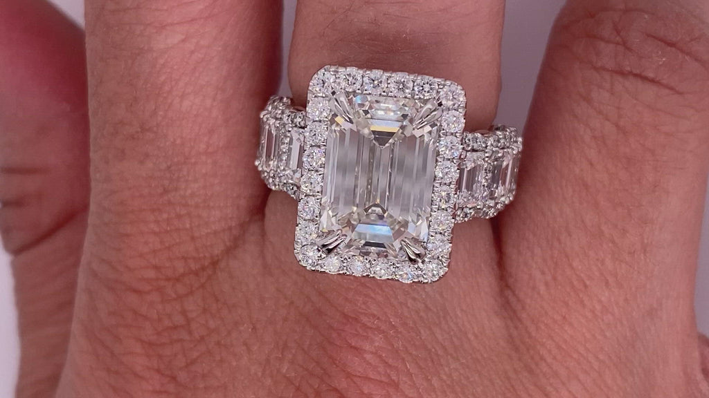 Diamond Ring Emerald Cut 9 Carat Halo Ring in 18K White Gold Video on Hand
