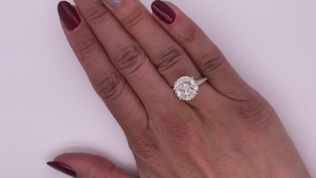 Diamond Ring Round Cut 5 Carat Sidestone Ring in 18K White Gold Video on Hand
