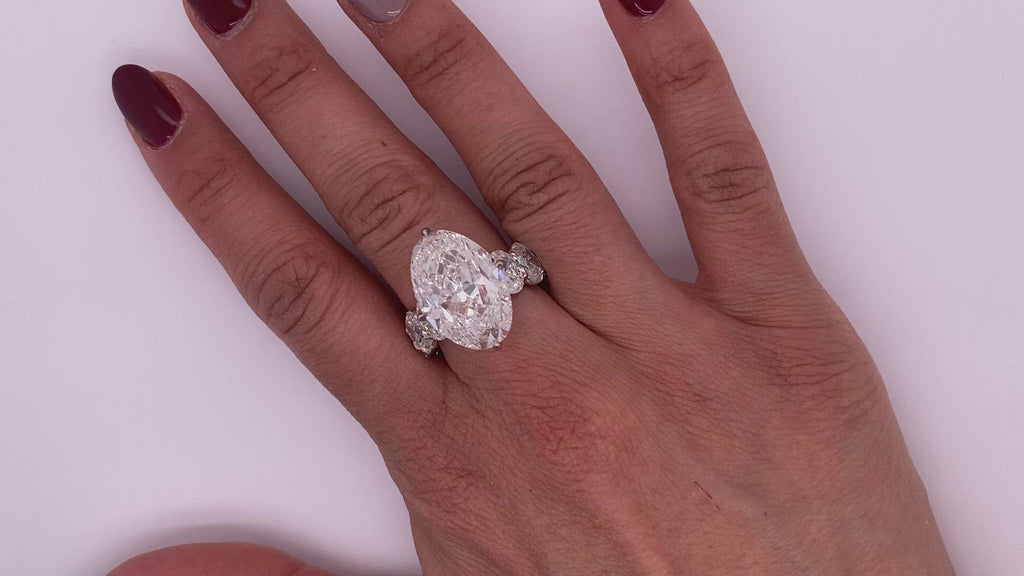 Diamond Engagement Ring Oval Cut 22 Carat Sidestone Ring in Platinum Video on Hand